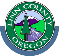 Linn County logo is circle with shape of fir tree with mountain, lake and green fields. Linn County Oregon words circle the center.