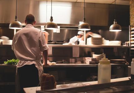 Cooks in restaurant kitchen