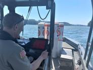 LCSO Marine Deputy Dan Graybill with buoys. 