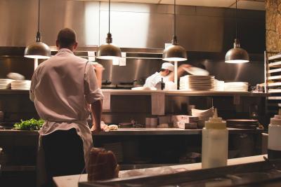 Cooks in restaurant kitchen