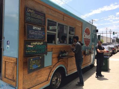 Taco truck serving customers