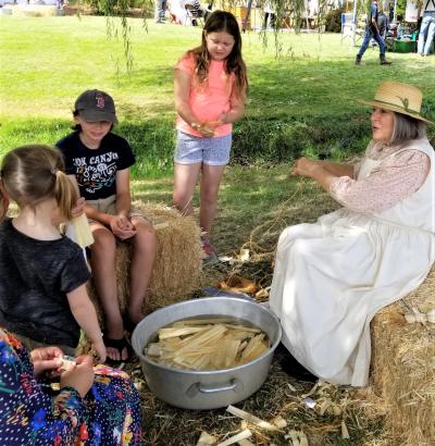 Making corn husk dolls