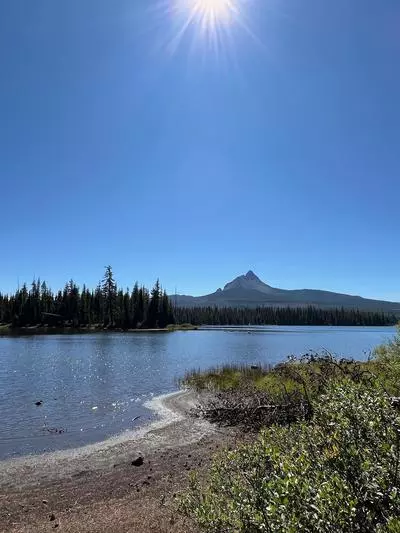 Sunny day at the lake with mountain in the distance