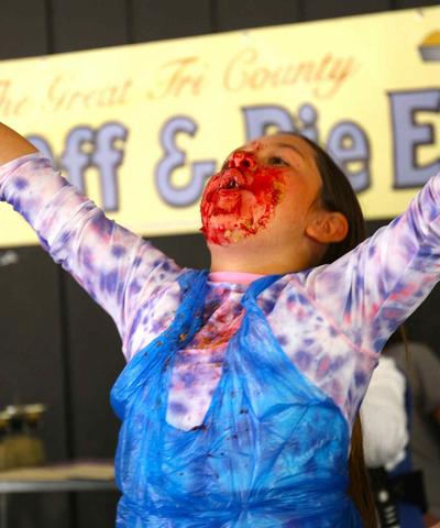 Pie Eating Contest- girl celebrating