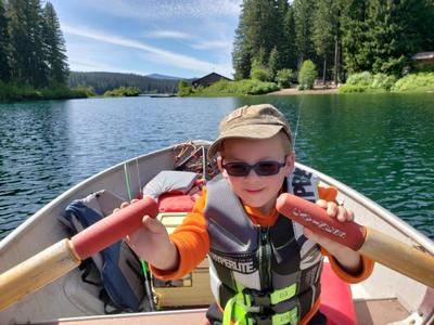 kid in boat
