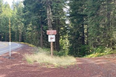 road from the highway with sign